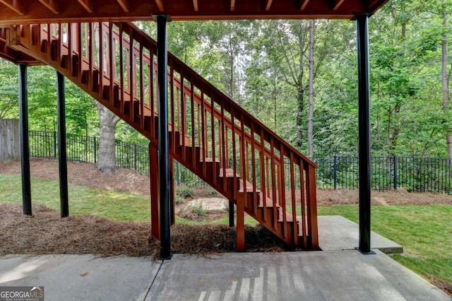 475 Bayswater Way, Suwanee, GA 30024 - exterior view of stairway and a fenced backyard