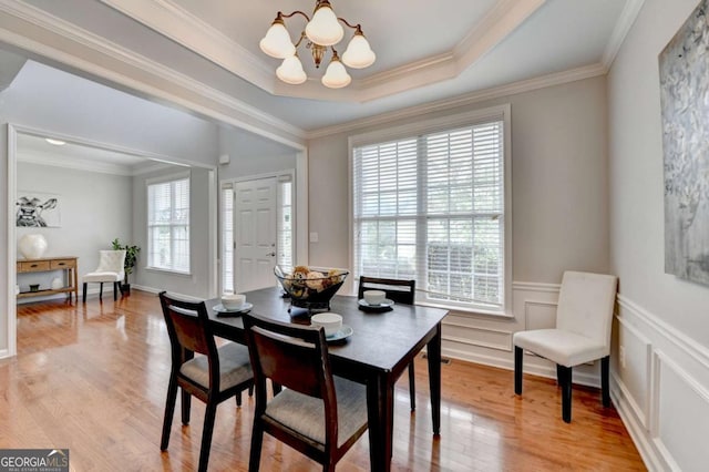 475 Bayswater Way, Suwanee, GA 30024 - dining space featuring a chandelier, light wood-style floors, ornamental molding, and wainscoting