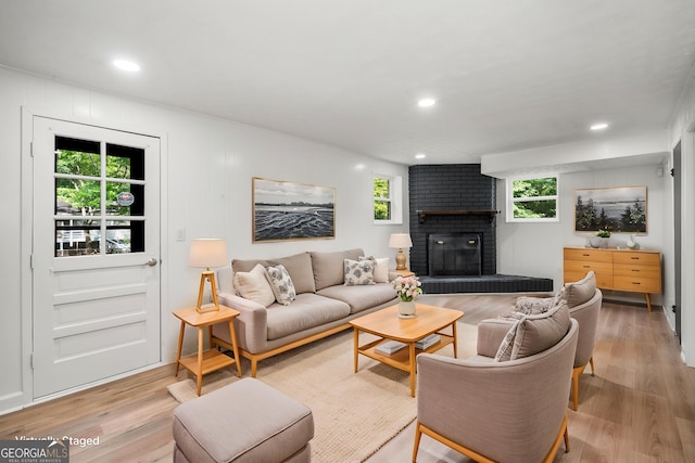 7455 Dover Ct, Riverdale, GA 30274 - living room featuring a fireplace, light wood-style floors, and recessed lighting
