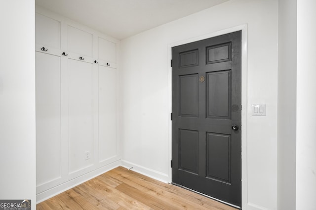7455 Dover Ct, Riverdale, GA 30274 - mudroom featuring light wood finished floors and baseboards