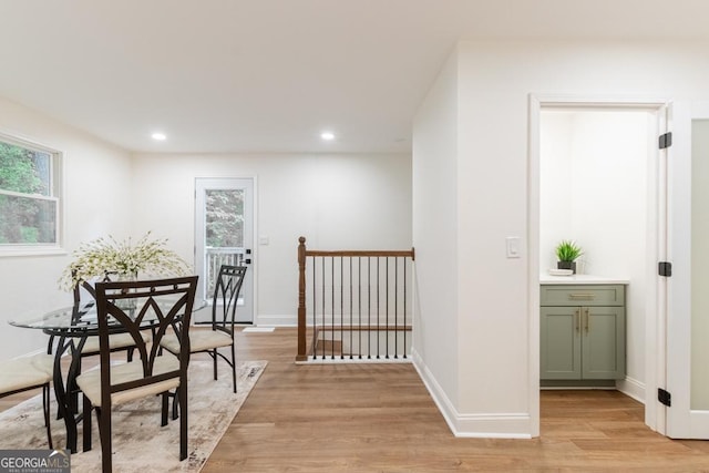 398 Baker Cir NW, Atlanta, GA 30318 - dining space featuring light wood finished floors, recessed lighting, healthy amount of natural light, and baseboards