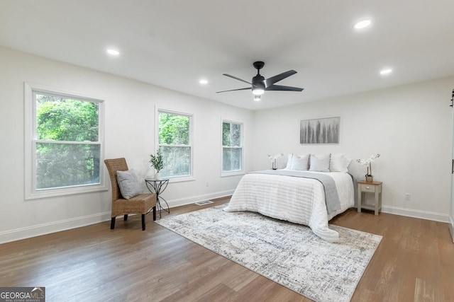 398 Baker Cir NW, Atlanta, GA 30318 - bedroom with baseboards, wood finished floors, recessed lighting, and ceiling fan