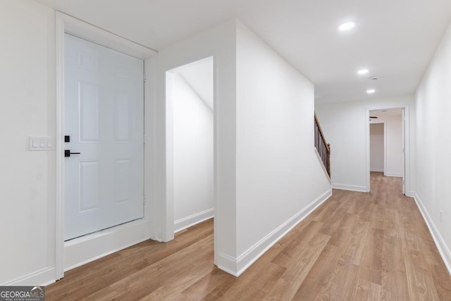 398 Baker Cir NW, Atlanta, GA 30318 - hall with light wood-style flooring, recessed lighting, stairway, and baseboards