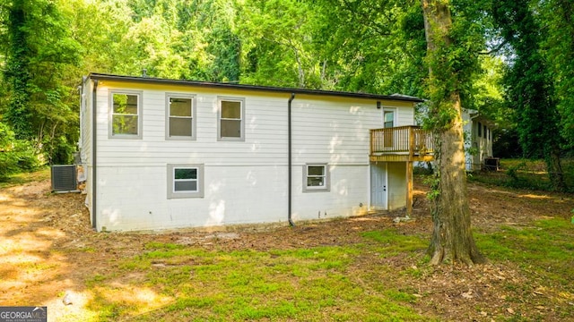 398 Baker Cir NW, Atlanta, GA 30318 - view of side of home featuring a deck and central AC
