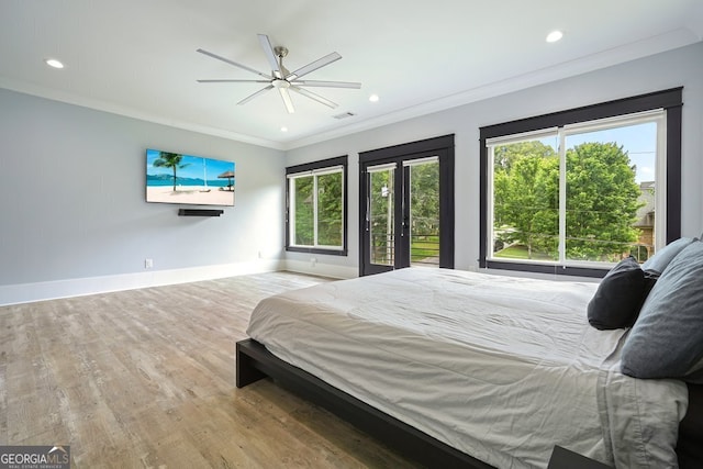 2804 Skyland Dr NE, Brookhaven, GA 30341 - bedroom with multiple windows, baseboards, wood finished floors, ornamental molding, and recessed lighting