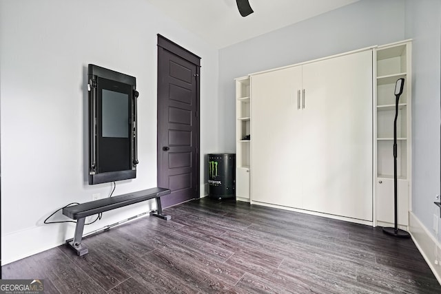 2804 Skyland Dr NE, Brookhaven, GA 30341 - unfurnished bedroom featuring wood finished floors, baseboards, and ceiling fan