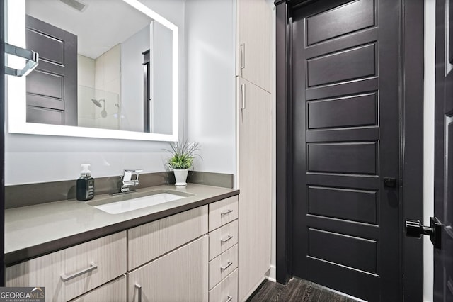 2804 Skyland Dr NE, Brookhaven, GA 30341 - full bath with vanity, wood finished floors, and a shower