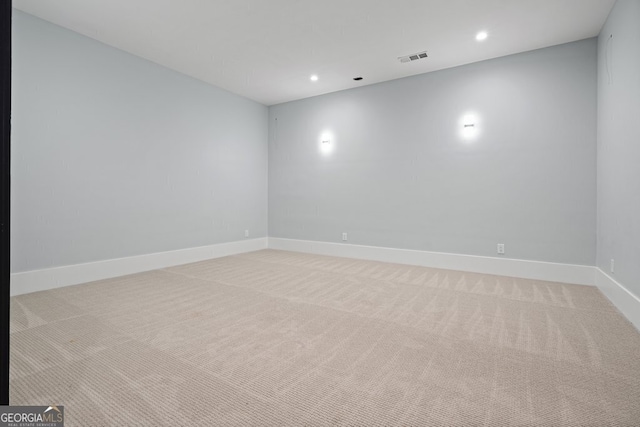 2804 Skyland Dr NE, Brookhaven, GA 30341 - spare room featuring light carpet, recessed lighting, and baseboards