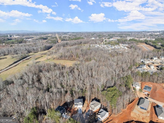 554 Creek Rd, Cornelia, GA 30531 - aerial view of property and surrounding area with a heavily wooded area
