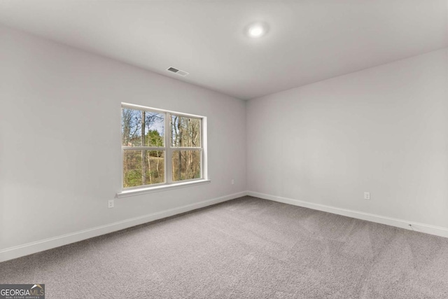 325 Magnolia Villas Dr, Cornelia, GA 30531 - spare room featuring baseboards and carpet floors
