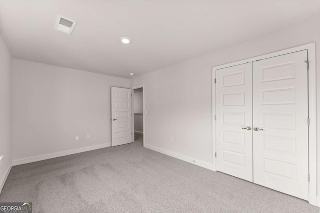 325 Magnolia Villas Dr, Cornelia, GA 30531 - unfurnished bedroom featuring carpet, baseboards, a closet, and recessed lighting