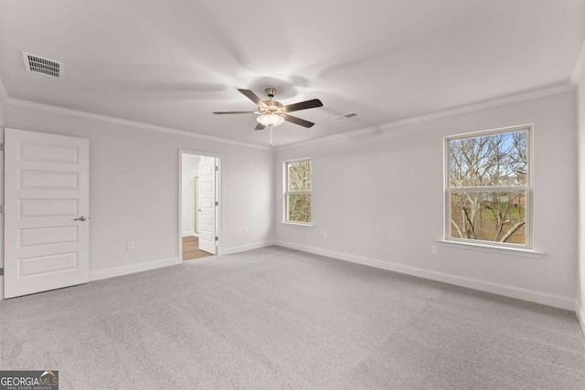 325 Magnolia Villas Dr, Cornelia, GA 30531 - carpeted spare room with ceiling fan, crown molding, and baseboards