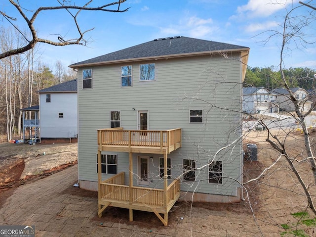 325 Magnolia Villas Dr, Cornelia, GA 30531 - back of house featuring a shingled roof, a balcony, and a deck