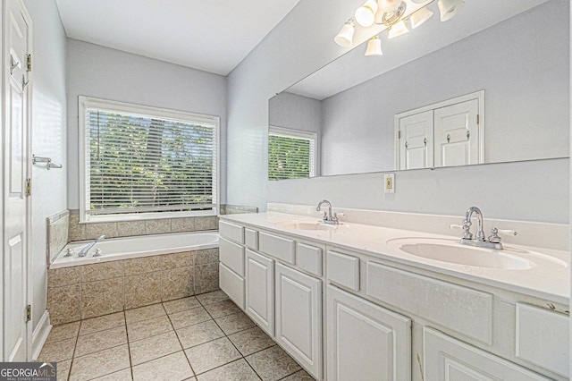 2701 Log Cabin Dr SE, Atlanta, GA 30339 - full bathroom featuring double vanity, a bath, and tile patterned flooring