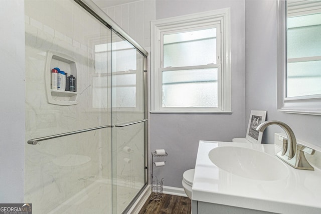 2701 Log Cabin Dr SE, Atlanta, GA 30339 - full bath with toilet, vanity, a marble finish shower, and wood finished floors