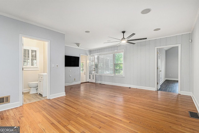 2701 Log Cabin Dr SE, Atlanta, GA 30339 - unfurnished living room featuring crown molding, light wood finished floors, ceiling fan, and baseboards