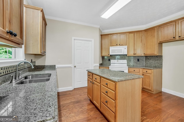 1315 Crane Ct, Mcdonough, GA 30252 - kitchen with electric range, white microwave, a sink, light stone countertops, and light wood-style floors