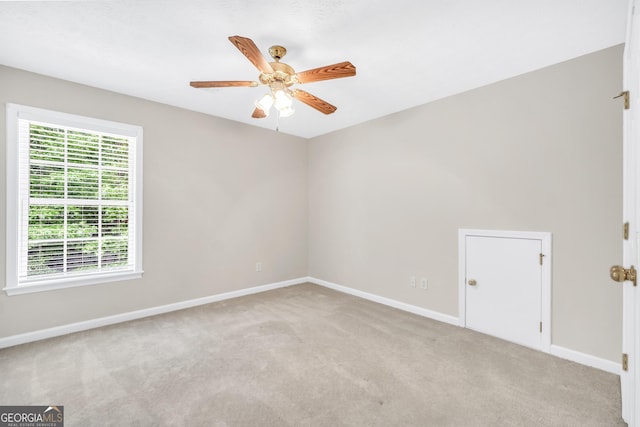 1315 Crane Ct, Mcdonough, GA 30252 - carpeted empty room with a ceiling fan and baseboards