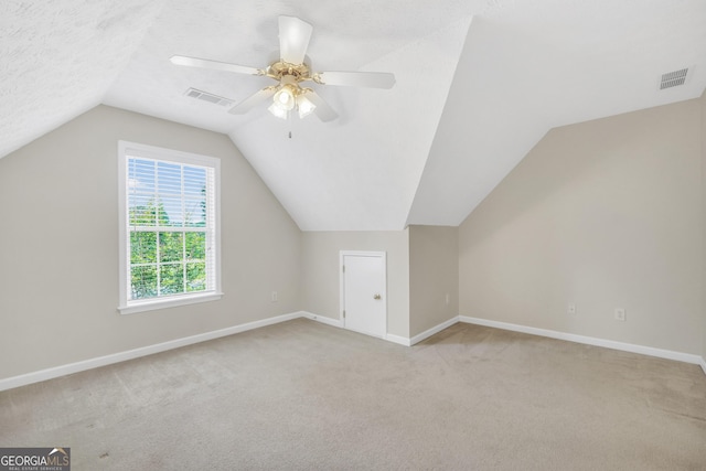 1315 Crane Ct, Mcdonough, GA 30252 - additional living space featuring carpet, baseboards, lofted ceiling, and ceiling fan