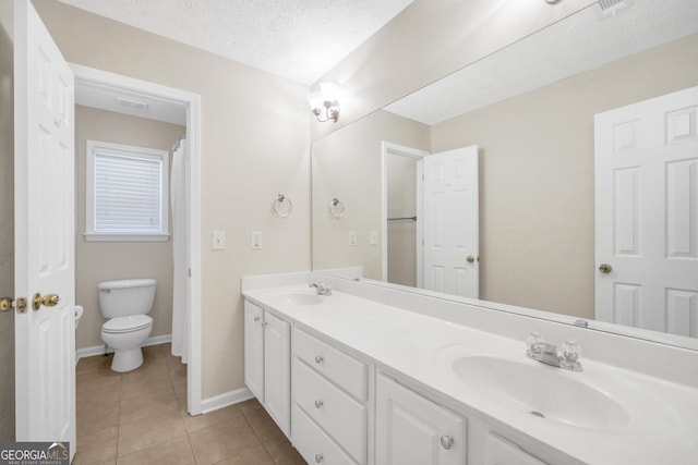 1315 Crane Ct, Mcdonough, GA 30252 - full bathroom featuring double vanity, tile patterned floors, toilet, and baseboards