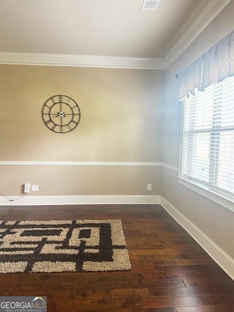 1869 Schofield Dr, Hampton, GA 30228 - spare room with ornamental molding and wood finished floors