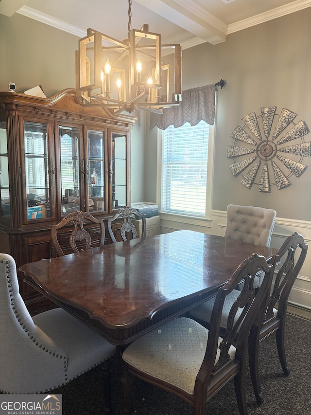 1869 Schofield Dr, Hampton, GA 30228 - dining area with crown molding, a wainscoted wall, and a chandelier