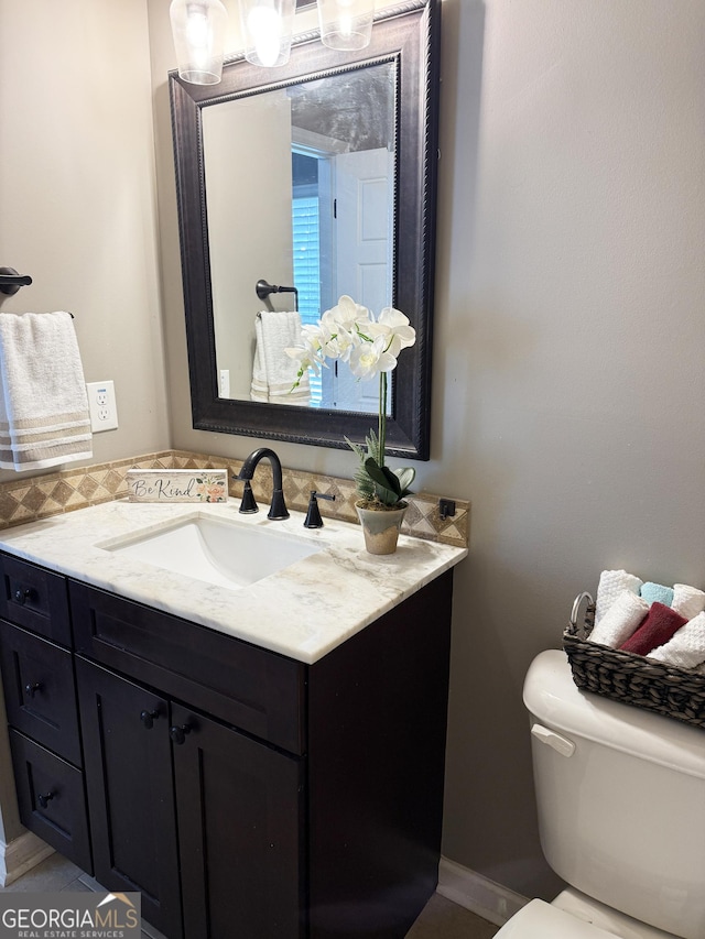 1869 Schofield Dr, Hampton, GA 30228 - half bath featuring vanity and toilet