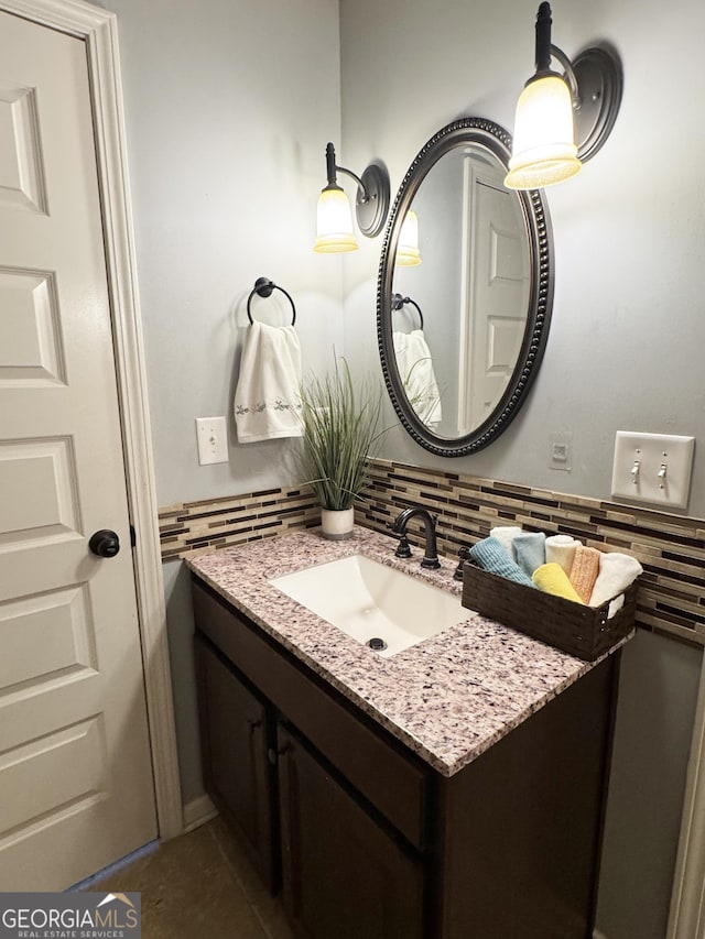 1869 Schofield Dr, Hampton, GA 30228 - bathroom with vanity and decorative backsplash