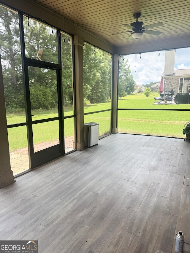 1869 Schofield Dr, Hampton, GA 30228 - unfurnished sunroom featuring a ceiling fan