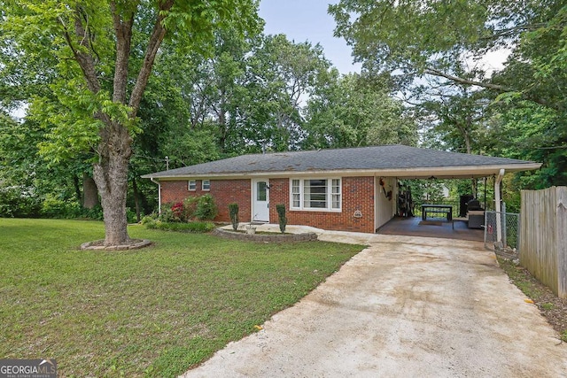 4110 Belvedere Dr, Gainesville, GA 30506 - single story home with concrete driveway, brick siding, and a carport
