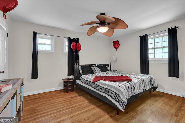 4110 Belvedere Dr, Gainesville, GA 30506 - bedroom with light wood-style floors, baseboards, and ceiling fan
