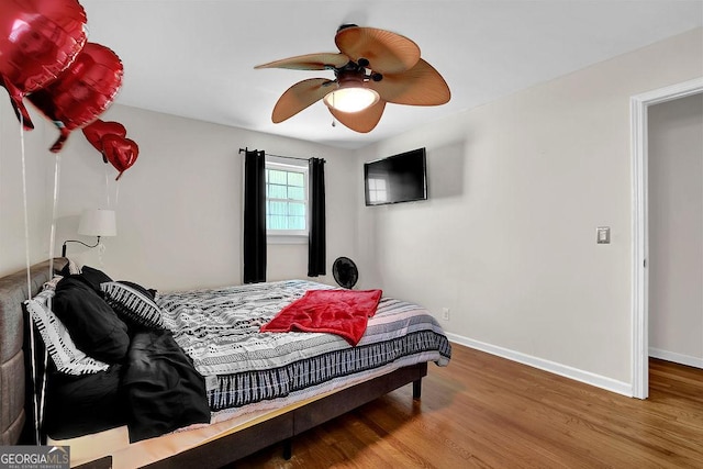 4110 Belvedere Dr, Gainesville, GA 30506 - bedroom with wood finished floors, baseboards, and a ceiling fan