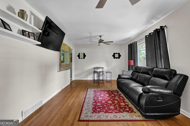 4110 Belvedere Dr, Gainesville, GA 30506 - living area with ceiling fan, wood finished floors, and baseboards