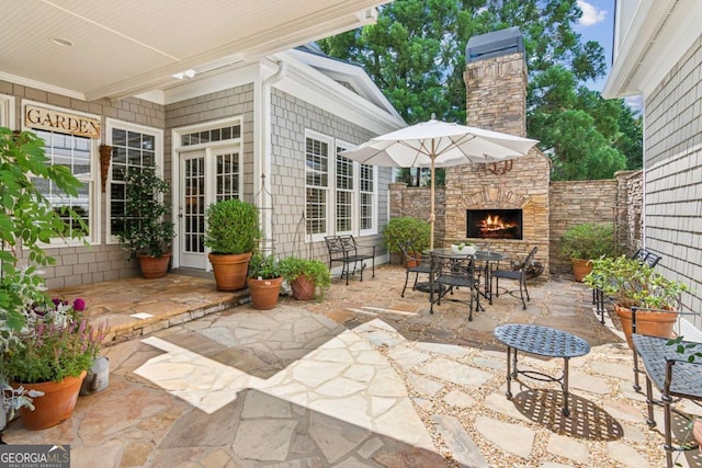 3903 Hazelhurst Dr, Marietta, GA 30066 - view of patio / terrace with an outdoor stone fireplace and outdoor dining area