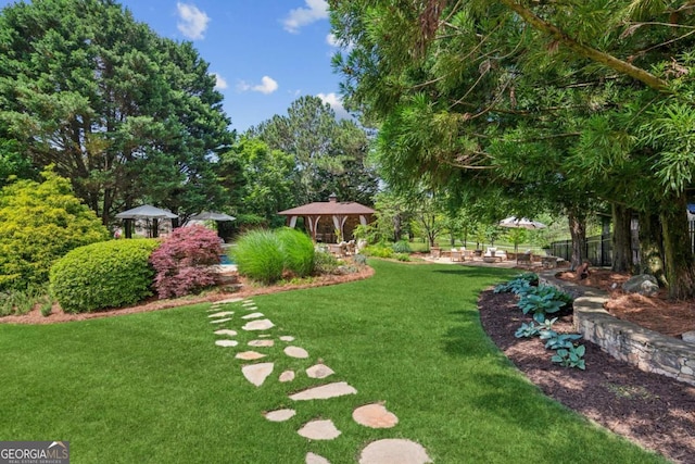 3903 Hazelhurst Dr, Marietta, GA 30066 - view of grassy yard with a gazebo and view of scattered trees