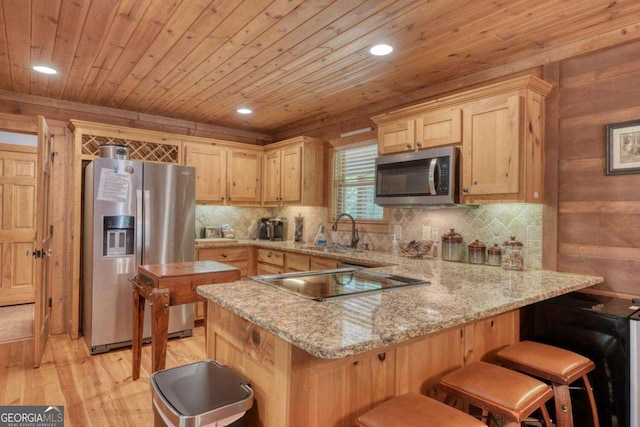 602 Mill Ridge Rd, Hiawassee, GA 30546 - kitchen featuring stainless steel appliances, a peninsula, wooden ceiling, light wood finished floors, and decorative backsplash