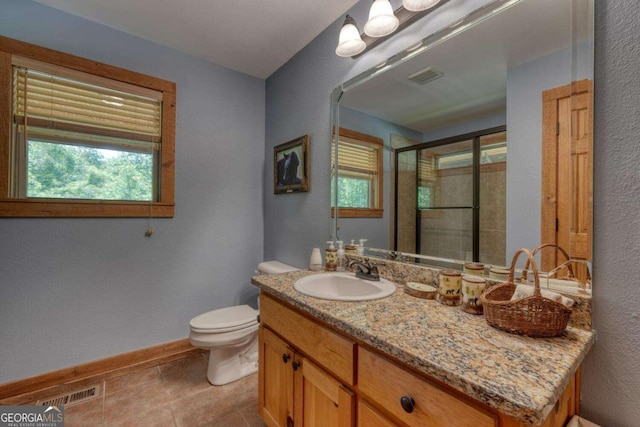 602 Mill Ridge Rd, Hiawassee, GA 30546 - bathroom featuring baseboards, toilet, a stall shower, vanity, and a textured wall