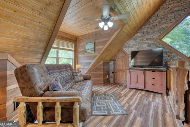 602 Mill Ridge Rd, Hiawassee, GA 30546 - living room featuring wood ceiling, lofted ceiling, light wood-style floors, wooden walls, and ceiling fan