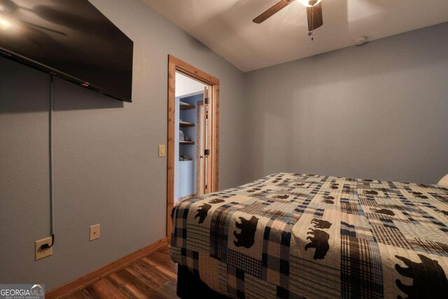602 Mill Ridge Rd, Hiawassee, GA 30546 - bedroom featuring dark wood finished floors, baseboards, ceiling fan, and a closet