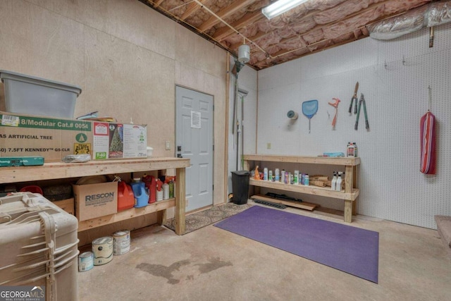 602 Mill Ridge Rd, Hiawassee, GA 30546 - misc room with concrete floors and a workshop area