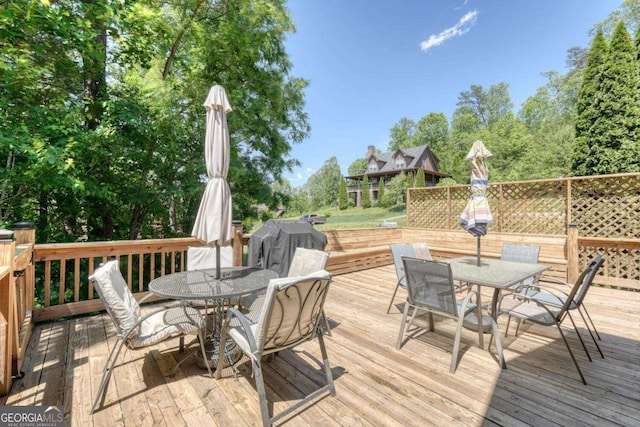 602 Mill Ridge Rd, Hiawassee, GA 30546 - wooden deck featuring outdoor dining area