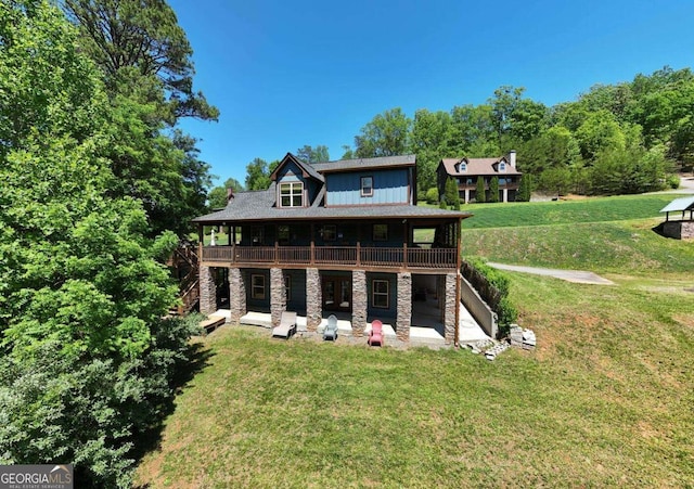 602 Mill Ridge Rd, Hiawassee, GA 30546 - rear view of house with stairway, a patio area, a wooden deck, a lawn, and stone siding
