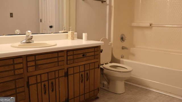 114 Sycamore Rd SW, Milledgeville, GA 31061 - full bath featuring vanity, toilet, bathing tub / shower combination, and tile patterned floors