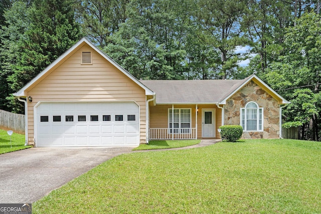 7847 Dogwood Way, Douglasville, GA 30134 - single story home with concrete driveway, stone siding, covered porch, a garage, and roof with shingles