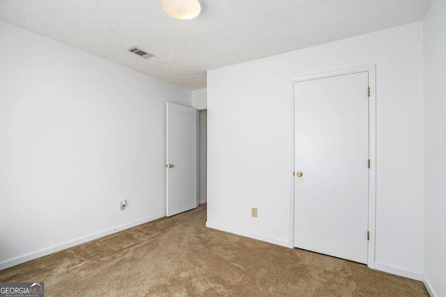 7847 Dogwood Way, Douglasville, GA 30134 - unfurnished bedroom featuring carpet and baseboards