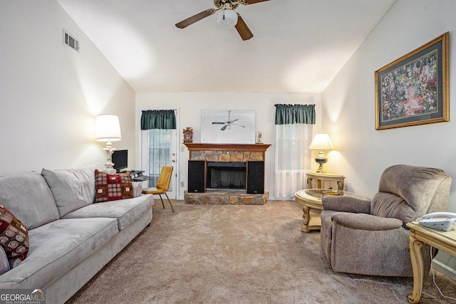 7847 Dogwood Way, Douglasville, GA 30134 - living area featuring ceiling fan, carpet flooring, vaulted ceiling, and a stone fireplace