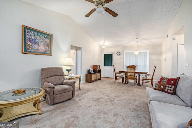 7847 Dogwood Way, Douglasville, GA 30134 - carpeted living area with ceiling fan, lofted ceiling, a chandelier, and baseboards