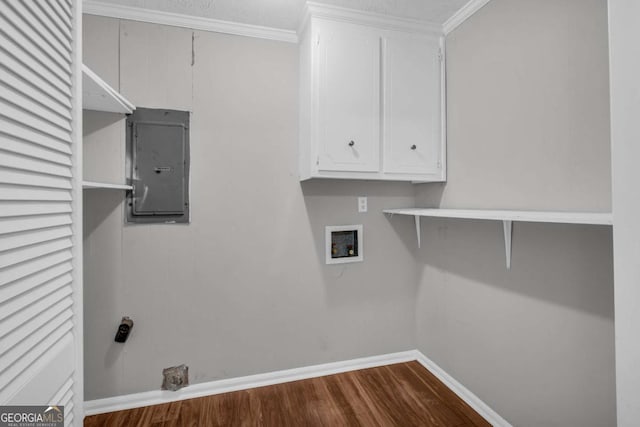 3642 S Bogan Rd, Buford, GA 30519 - laundry room with electric panel, washer hookup, baseboards, dark wood finished floors, and crown molding