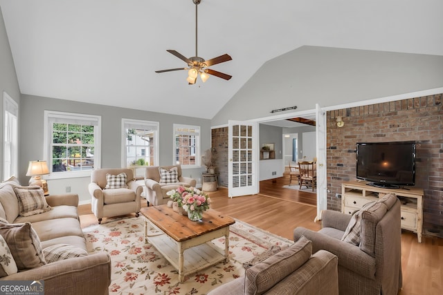 3642 S Bogan Rd, Buford, GA 30519 - living area featuring light wood-style floors, a ceiling fan, and high vaulted ceiling