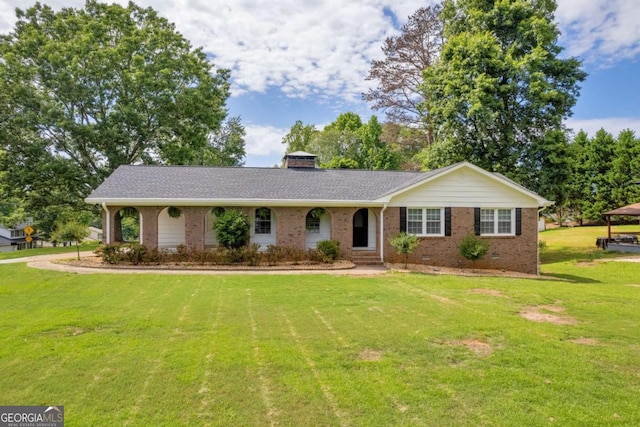 3642 S Bogan Rd, Buford, GA 30519 - single story home featuring brick siding, a front lawn, and a chimney